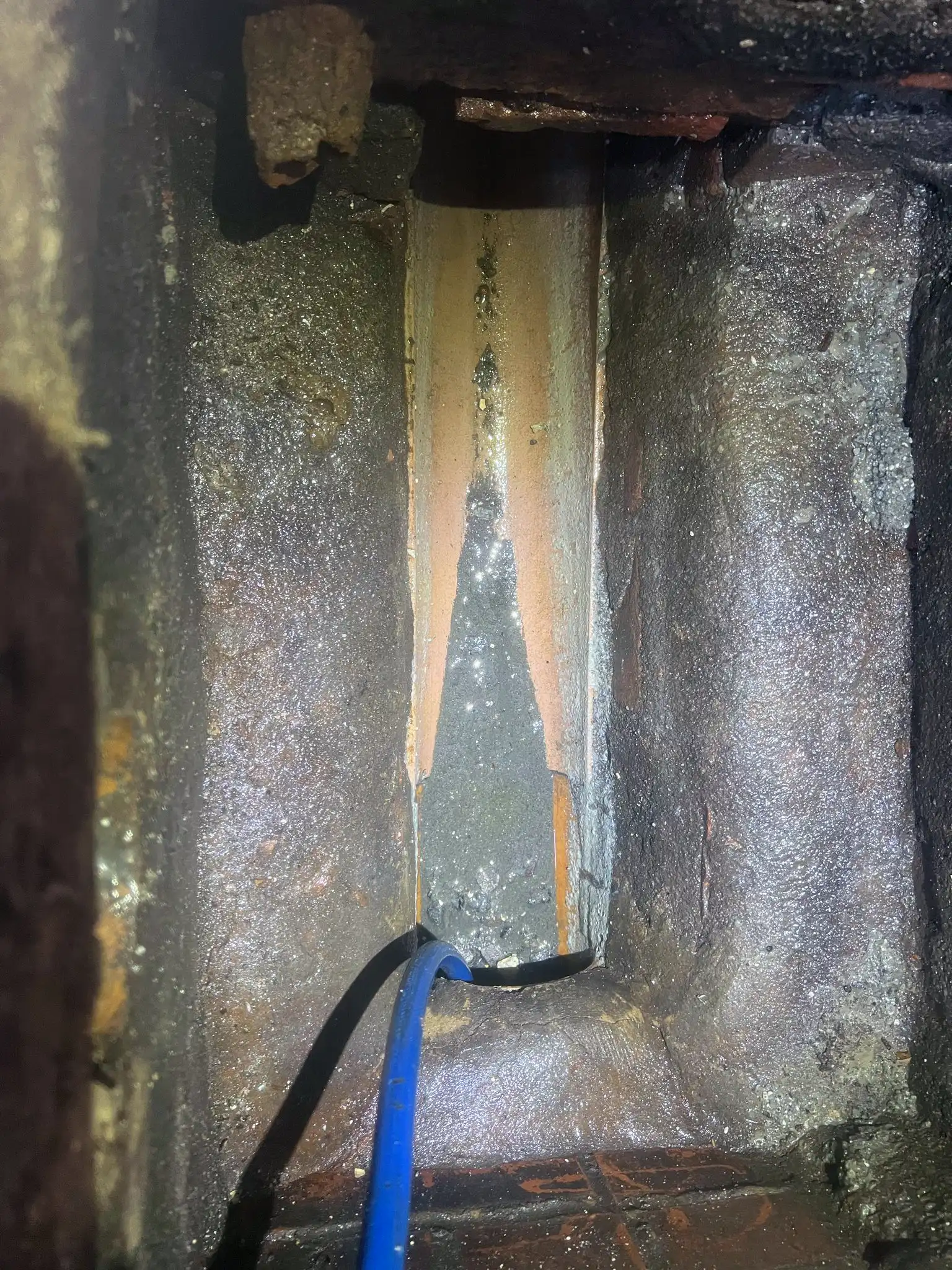 Heavy silt build-up inside an underground drain pipe caught during a CCTV inspection — a common cause of blockages across Cornwall towns including Truro, Liskeard, and Falmouth.